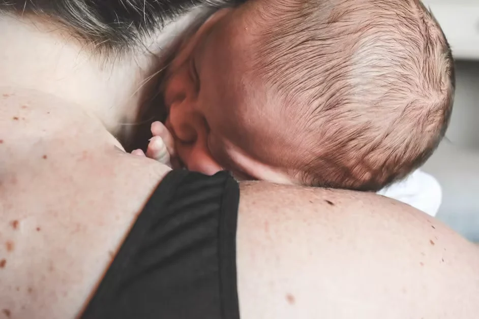 Why Your Back Still Hurts After Giving Birth - postpartum back pain relief