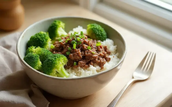 Generated illustration of lean beef and broccoli rice bowl, not a photograph of the dish